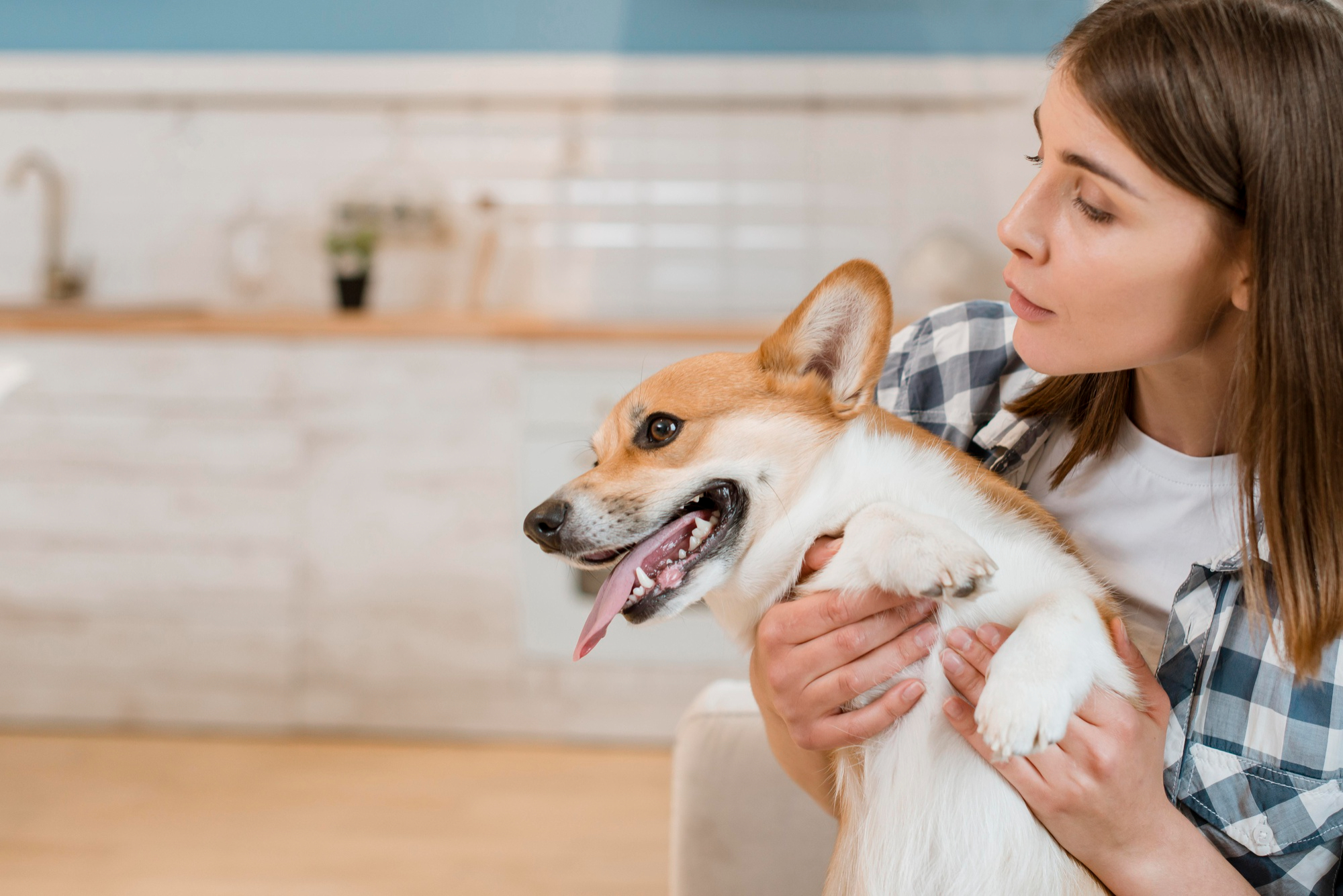 front-view-woman-holding-her-adorable-dog